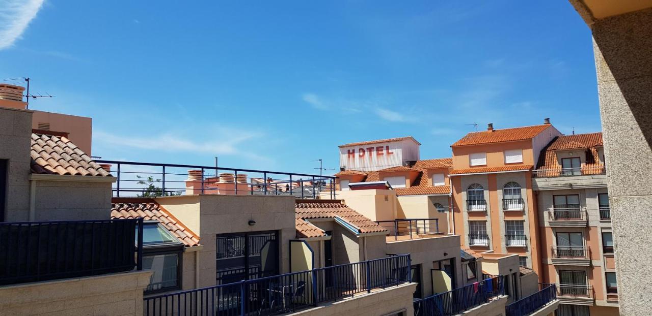 Piso Exterior A Escasos Metros De La Playa Panadeira Con Plaza De Garaje Appartement Sanxenxo Buitenkant foto